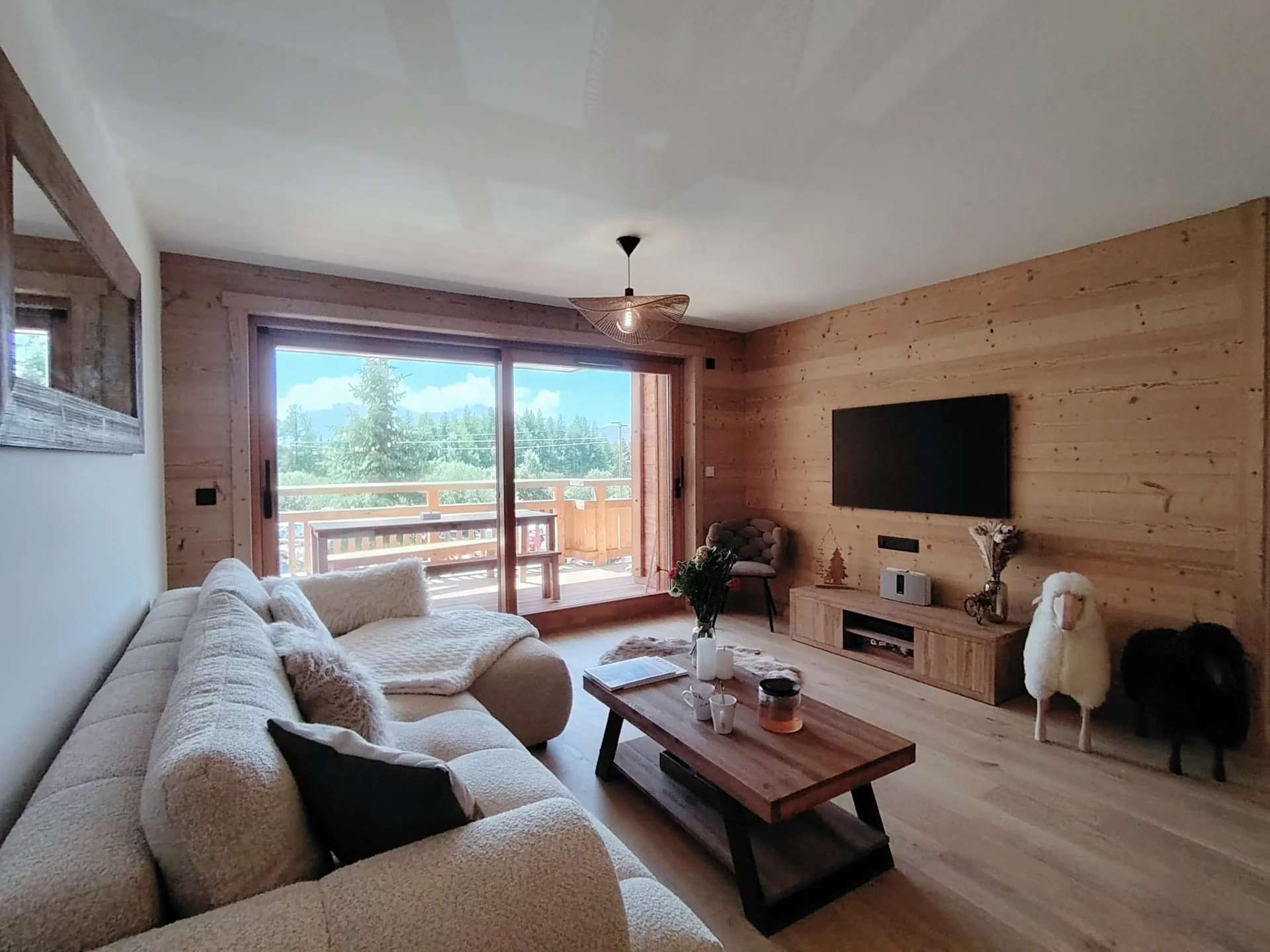 Salon d'un appartement à louer à l'alpe d'huez dans la résidence Cachemire