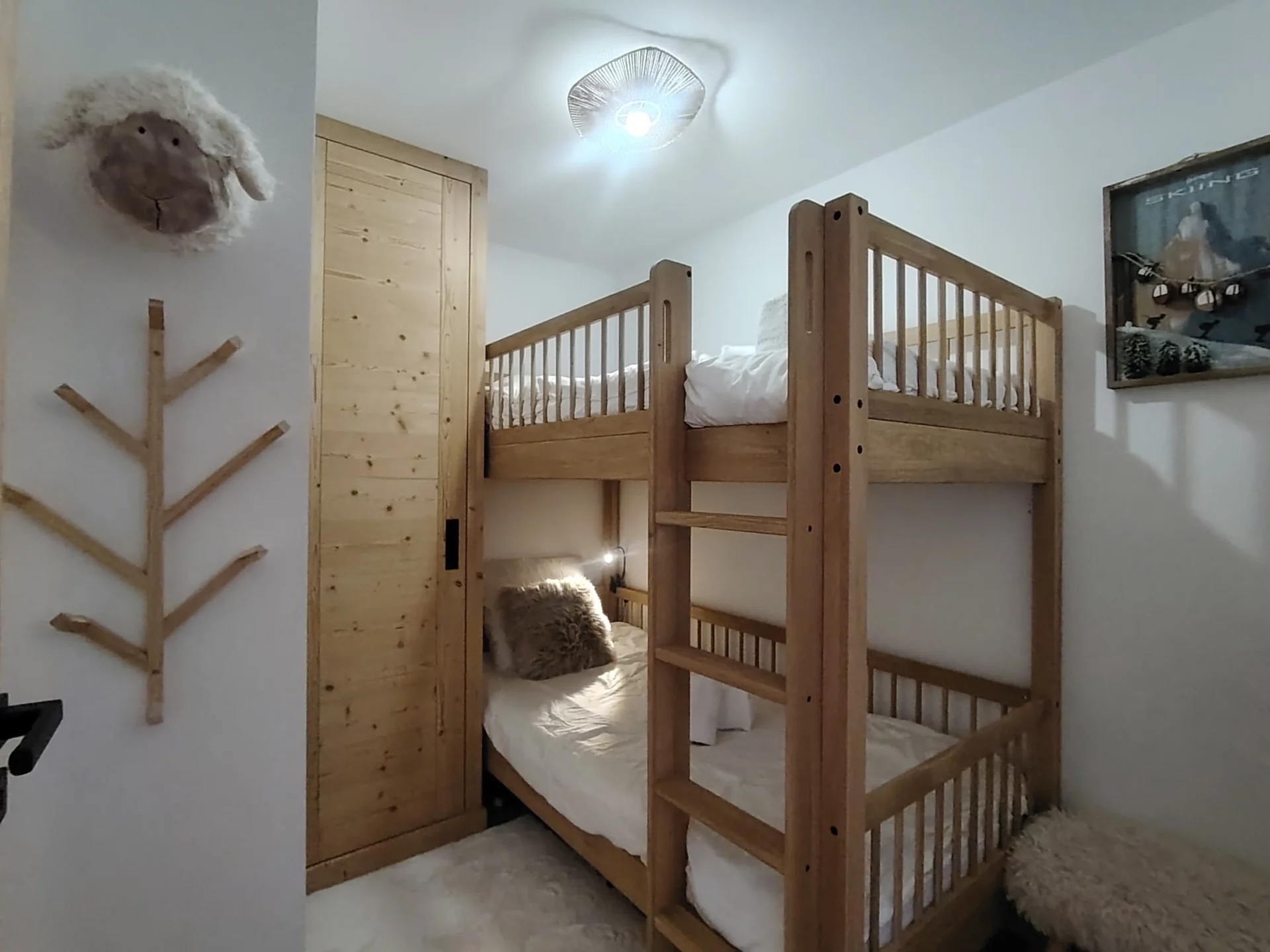 Location appartement à l'alpe d'huez avec chambre et 2 lits simples superposés
