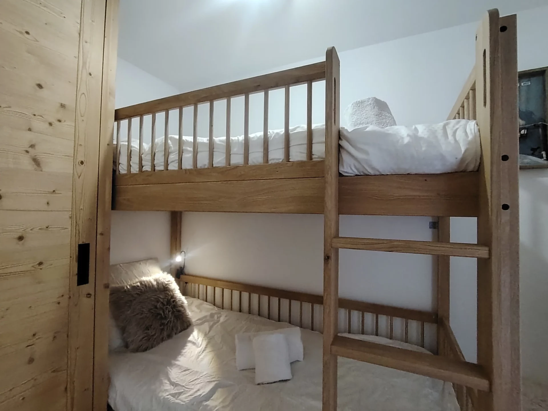 Location appartement à l'alpe d'huez avec chambre et 2 lits simples superposés